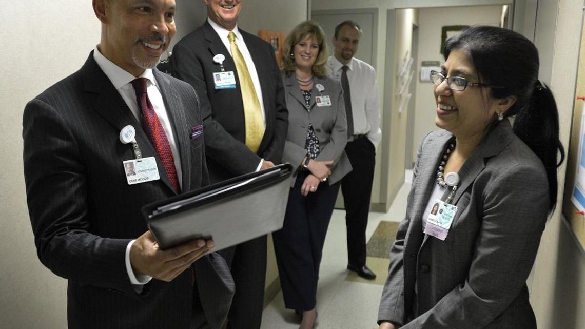 Gene Woods, left, is CEO of Carolinas HealthCare System, Charlotte’s largest employer with 35,000 employees.