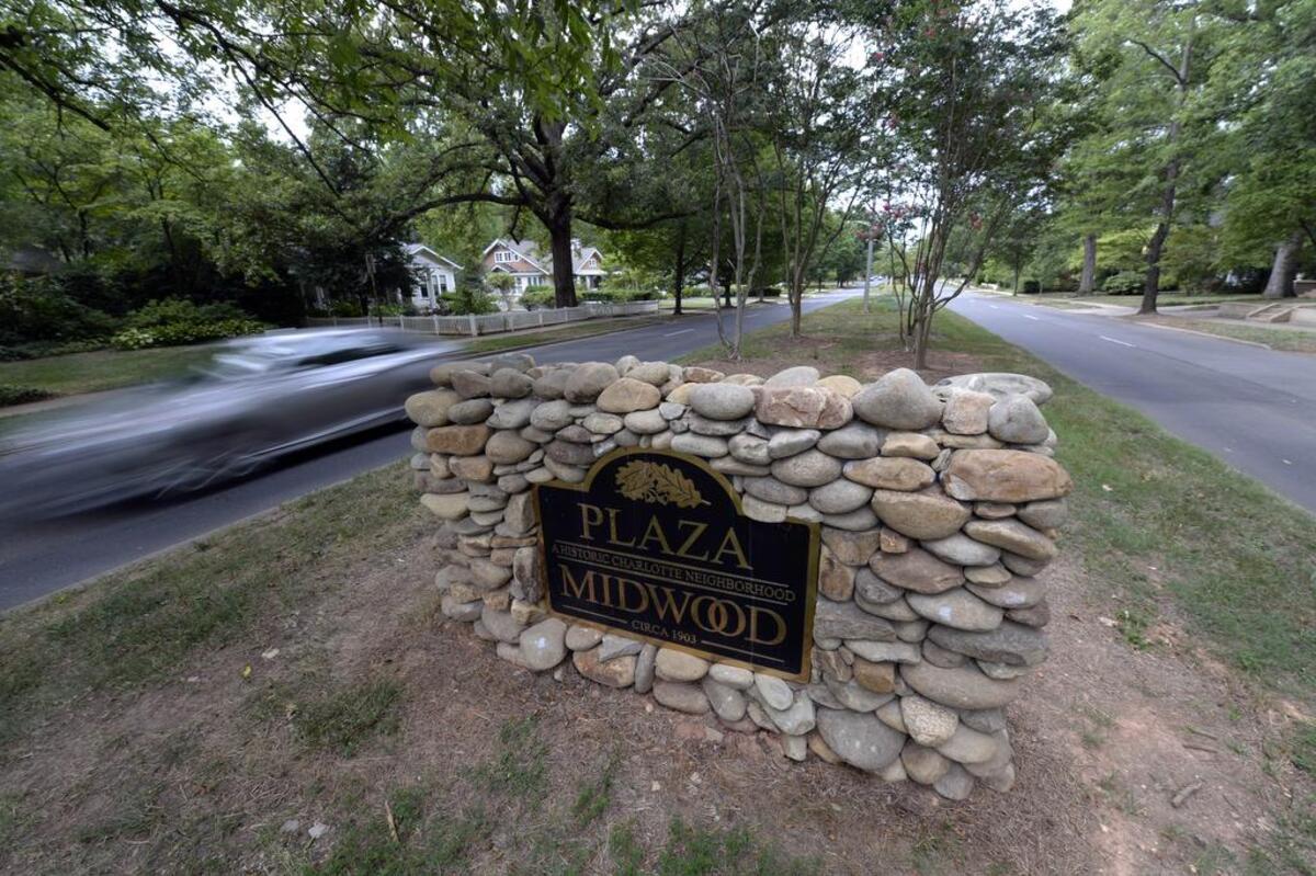 A stone-trimmed marker designates the Plaza Midwood neighborhood.