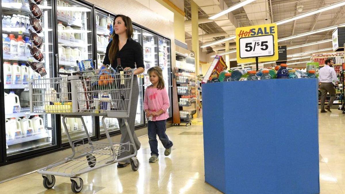 Amanda Marion and her 4-year-old daughter Adelynn Marion shop together at the Park Road Food Lion in Dilworth on April 07, 2016.