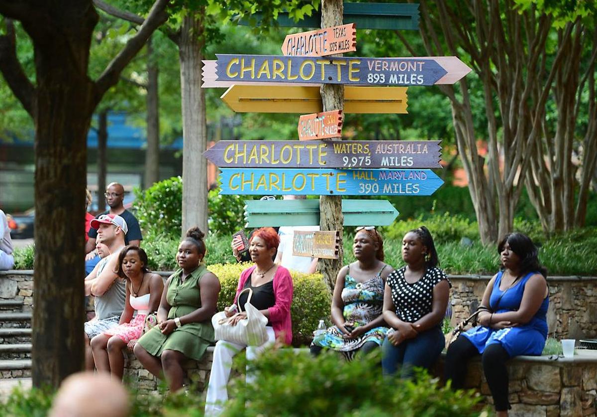 The audience watches as Charlotte Shakespeare actors perform "Love's Labor's Lost" at the Green in uptown Charlotte in 2014.