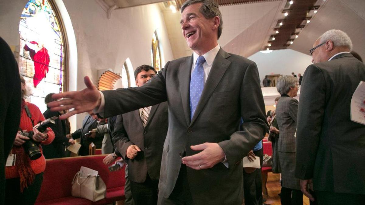 North Carolina Governor Roy Cooper greets well wishers following a prayer service on Jan. 6, 2017, at the First Baptist Church on S. Wilmington Street in Raleigh.