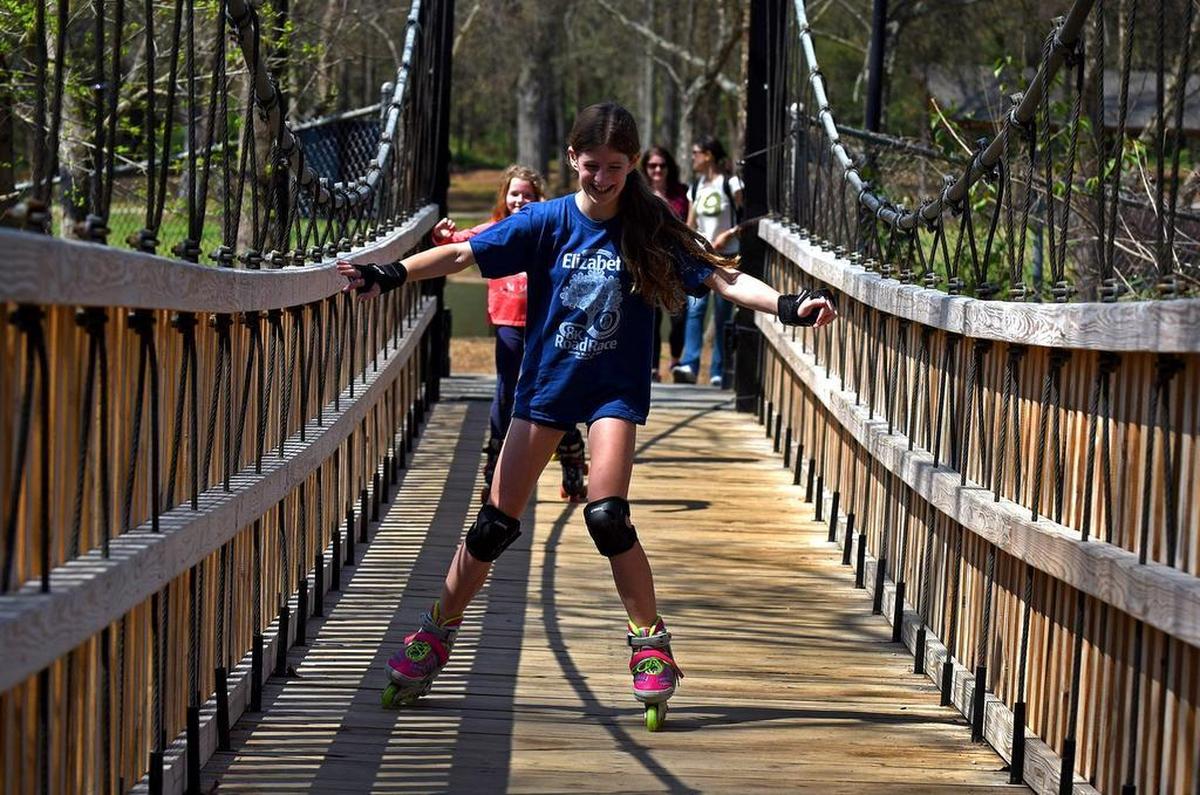 Freedom Park includes a bridge over the Little Sugar Creek for rollerblading and other adventures.