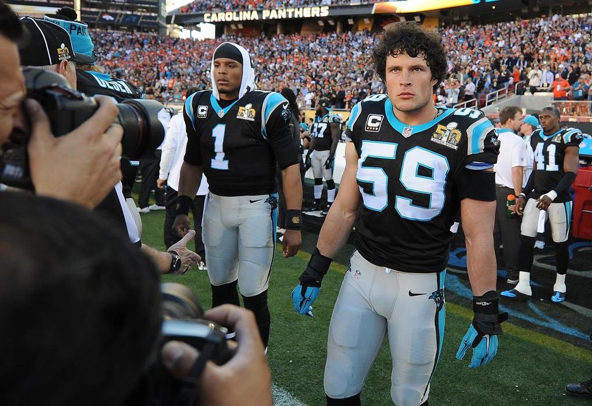 Carolina Panthers quarterback Cam Newton, left, and linebacker Luke Kuechly stand along the team's sideline at Levi’s Stadium in Santa Clara, Calif., on Feb. 7, 2016. The Denver Broncos defeated the Carolina Panthers 24-10 in Super Bowl 50.