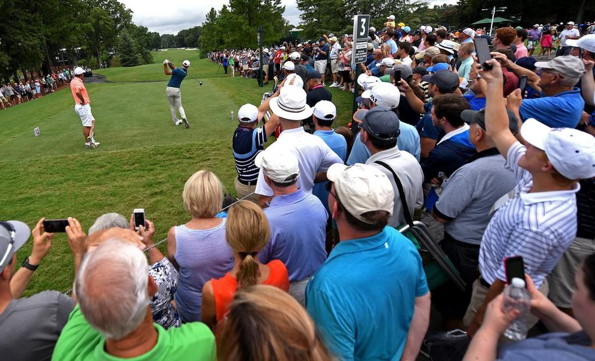 Dustin Johnson follows through on his drive from the third tee box during practice for the PGA Championship at Quail Hollow in 2017. The tournament was played in August that year; in 2025, it will be played in May.
