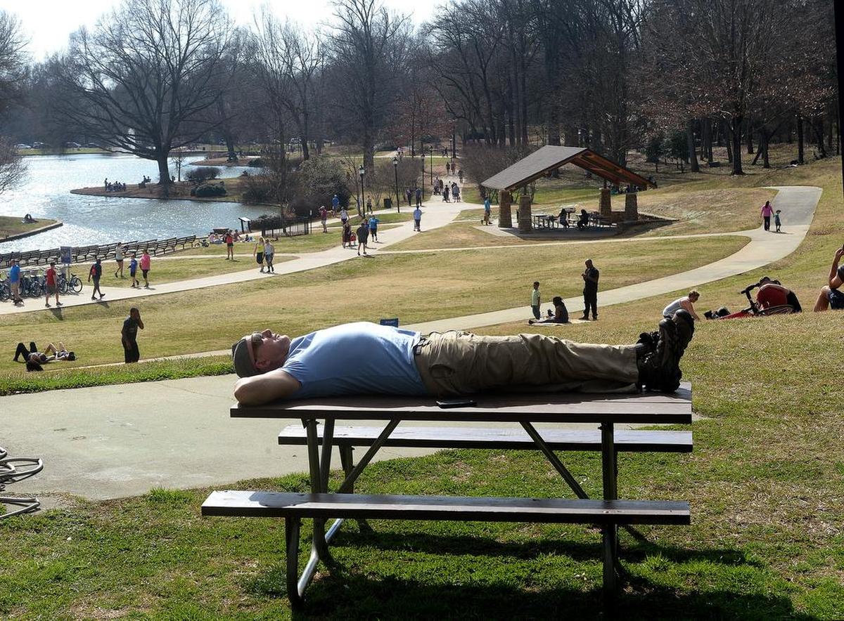 People at Freedom Park enjoy a sunny Sunday.