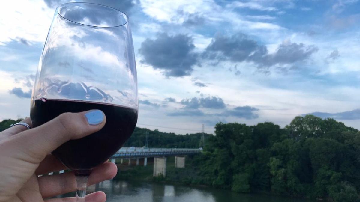 Enjoy a glass of wine on the rooftop deck of The Pump House in Rock Hill.