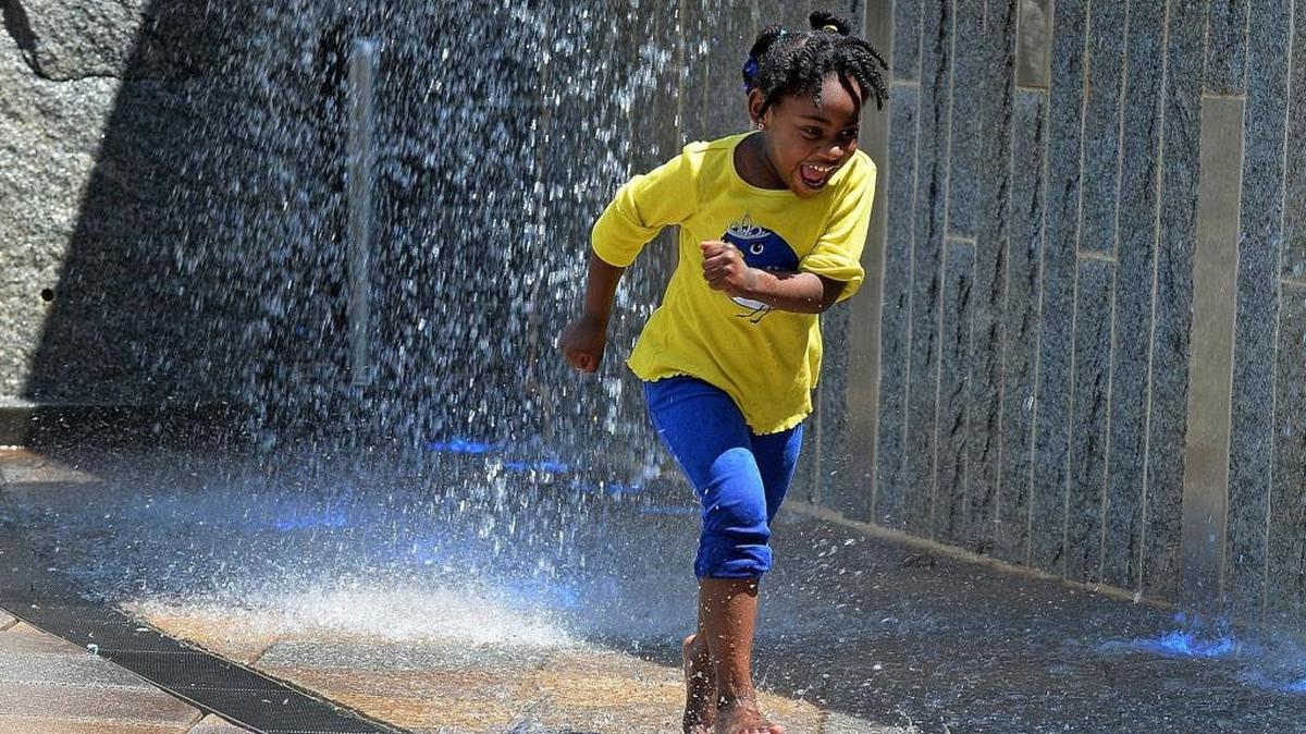 The fountain at Romare Bearden Park in uptown offers cool relief on hot summer days. A dangerous heat wave and severe storms with hail and damaging winds threaten the Charlotte region, National Weather Service meteorologists said Friday, June 30, 2023.