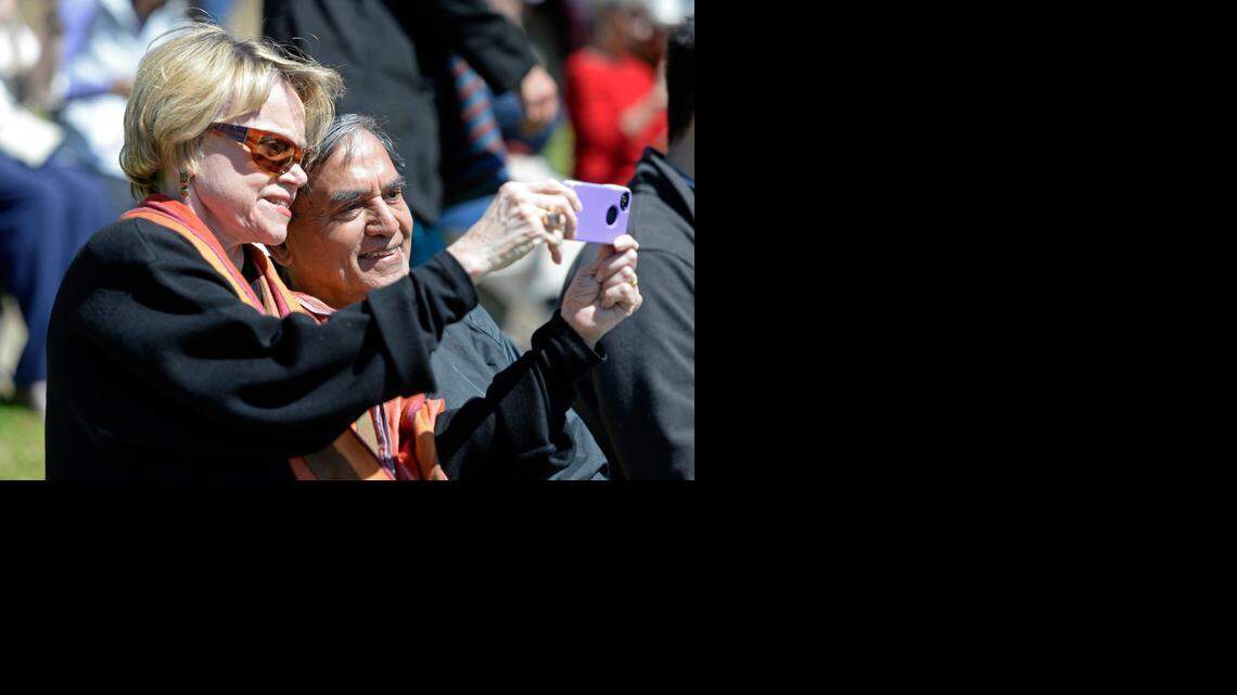 
Dianne English, left, and Thakor Topiwala shoot a selfie, along with others in the crowd, during the Peace in the Park: United Against Violence rally in Marshall Park on Sunday, March 29, 2015. 
