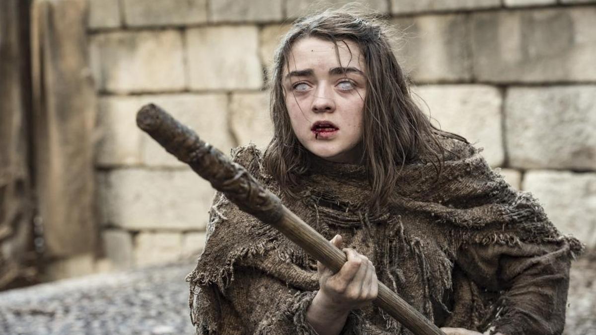Maisie Williams as Arya Stark in ‘Game of Thrones,’ remains entangled with the Many-Faced God. The religion’s insistence that people are faceless highlights its belief that there is only one thing before which we are all equal – death.