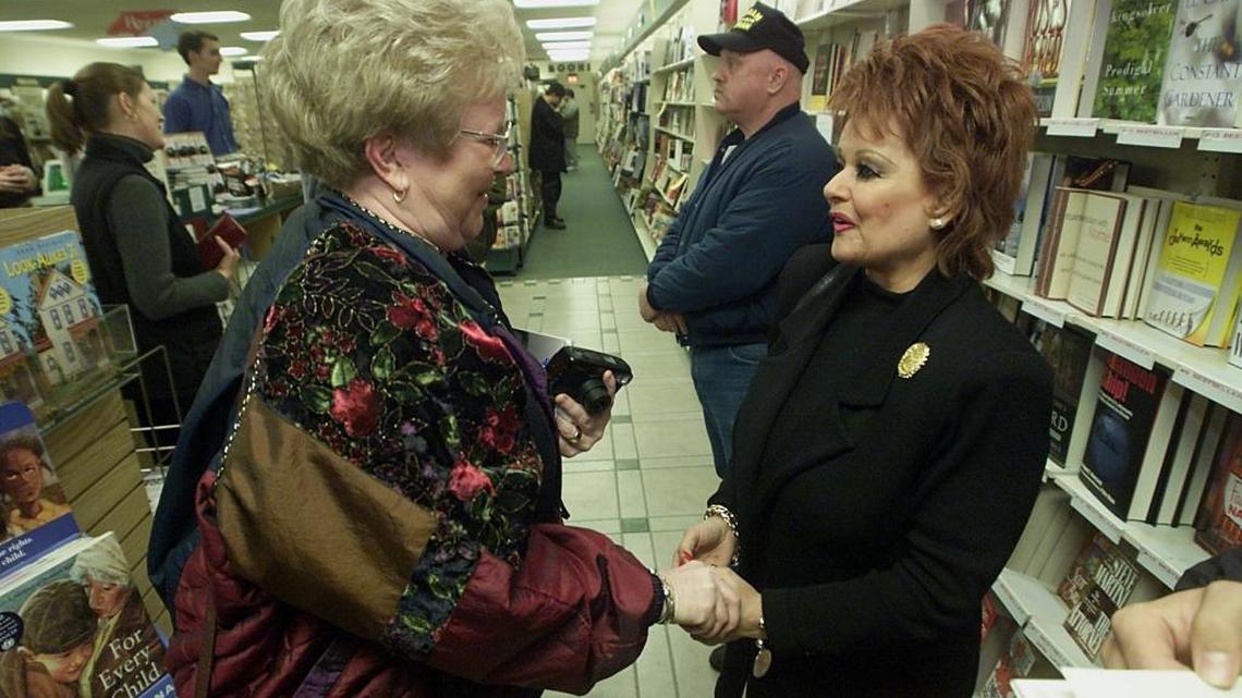 In 2001, Tammy Faye Messner (right) showed up at Charlotte’s Little Professor Book Center for a book signing by her son, Jay, author of “Son of a Preacher Man.” Here, Messner speaks with Carolyn Chamberlain (left) of Lancaster, S.C.