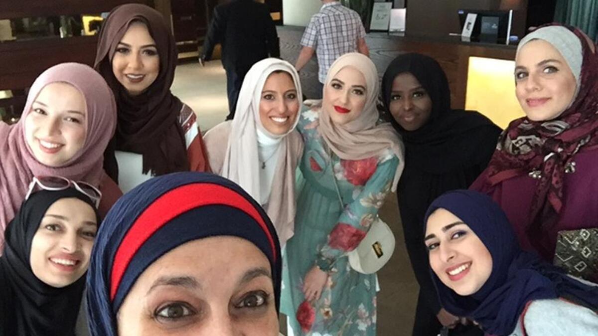 "Internet Famous" ladies attending London Modest Fashion Week (clockwise behind Rose Hamid at front) Meriem Lebdiri @MeriemLedbiri, Selma Lebdiri @SelmaLedbiri, Soha Mohamed Taha @SohaMT, Melanie Elturk @hautehijab, Leena Asad, @withloveleena, Hodan Yusuf @CheeseandXalwo, Samah Safi Bayazid @samahsafi and Rawan Elbaba @rawandering.