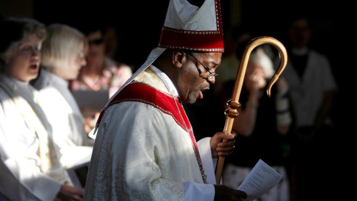 Bishop Michael Curry of the Episcopal Diocese of North Carolina leads the procession during a service commemorating the life of Anna Pauline Murray at St. Titus Episcopal Church in Durham July 1, 2009.