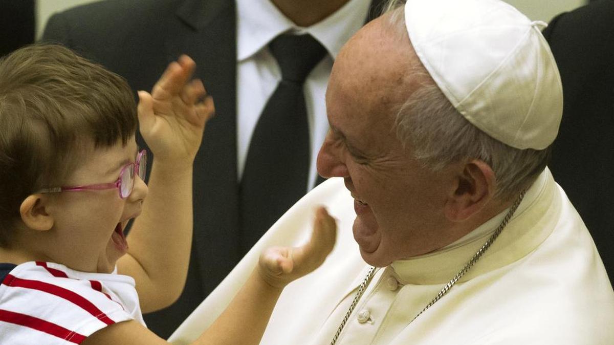 
Pope Francis greets a child at the end of an audience to Parish groups promoting evangelization, in the Paul VI hall at the Vatican on Saturday, Sept. 5, 2015. Francis made a sweeping apology for the church’s sins and “crimes” against indigenous peoples during a visit to Bolivia in July, “humbly” begging forgiveness in the presence of Bolivia’s first-ever indigenous president and representatives of native groups from across South America, who wildly cheered the pope and said they accepted the apology. 

