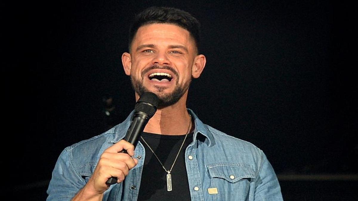 Pastor Steven Furtick of Elevation Church, based in the Charlotte area. Here he ministers to the audience during the national Outcry Tour 2017 concert at Bojangles' Coliseum in May.