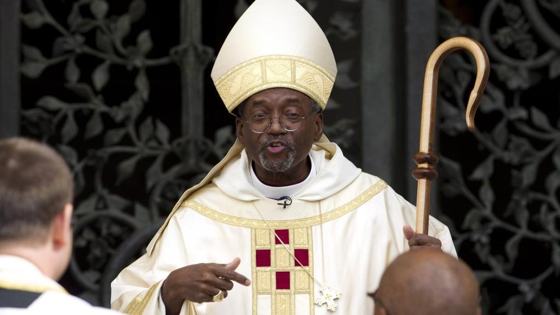 Episcopal Church Presiding Bishop Michael Curry, shown speaking to churchgoers as he arrives at the Washington National Cathedral in Washington. On Thursday, Anglican leaders temporarily restricted the role of the U.S. Episcopal Church in their global fellowship as a sanction over the American church’s acceptance of gay marriage.