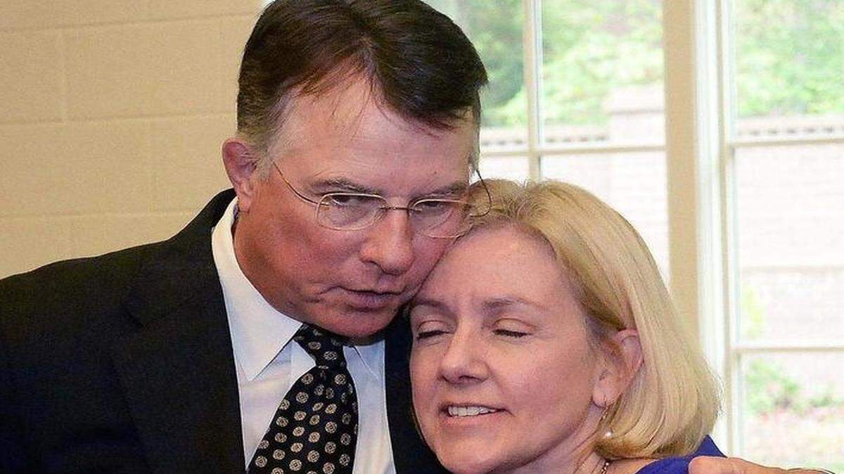 
From left, Rev. Steve Eason hugs church member Patricia Faris during a noon reception held in his honor on Sunday April, 26,2015. Eason, pastor of Myers Park Presbyterian Church is leaving the biggest Presbyterian church in Charlotte to teach, coach and organize workshops for ministers of various denominations.
