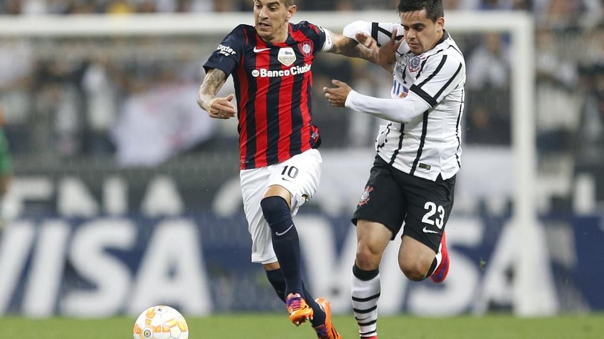 Argentina's San Lorenzo soccer team (Leandro Romagnoli, at left), is a favorite of Pope Francis. At his sports and faith summit, he called to keep sports honest.