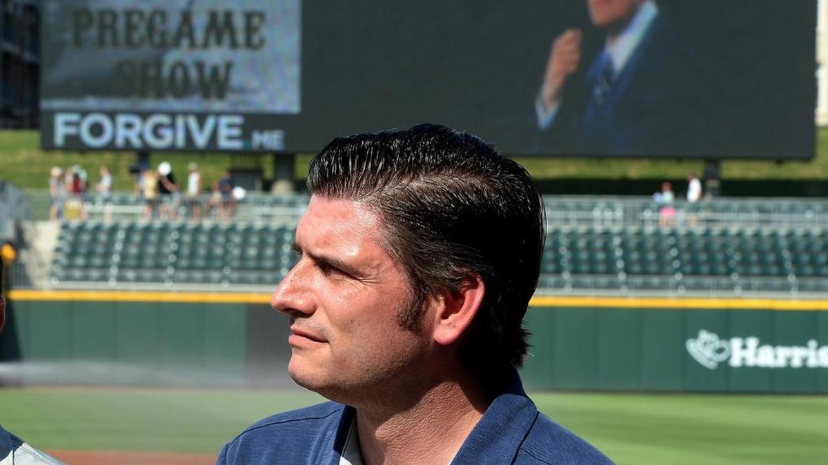 Billy Graham’s grandson Will Graham, also an evangelist, watches a video presentation about his 98-year-old grandfather before speaking as part of Faith and Family Night at Sunday’s Charlotte Knights game. Billy Graham’s first career aspiration was to be a Major League Baseball player.