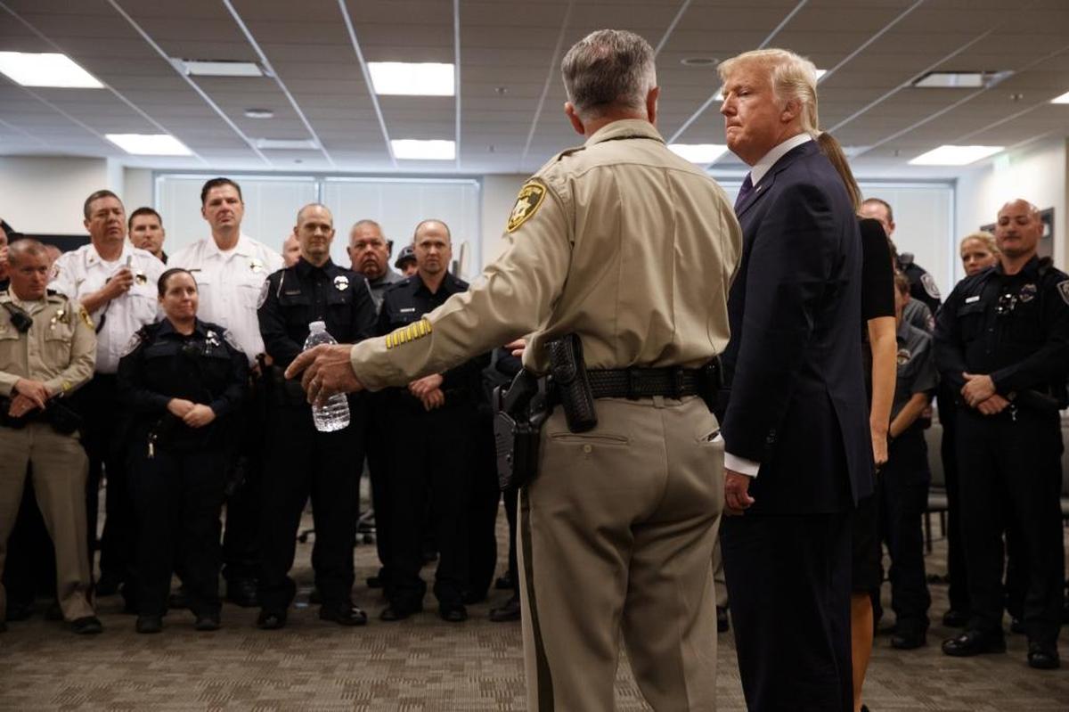 President Donald Trump listens to Clark County Sheriff Joseph Lombardo during a meeting with first responders at the Las Vegas Metropolitan Police Department, Wednesday, Oct. 4, 2017, in Las Vegas.