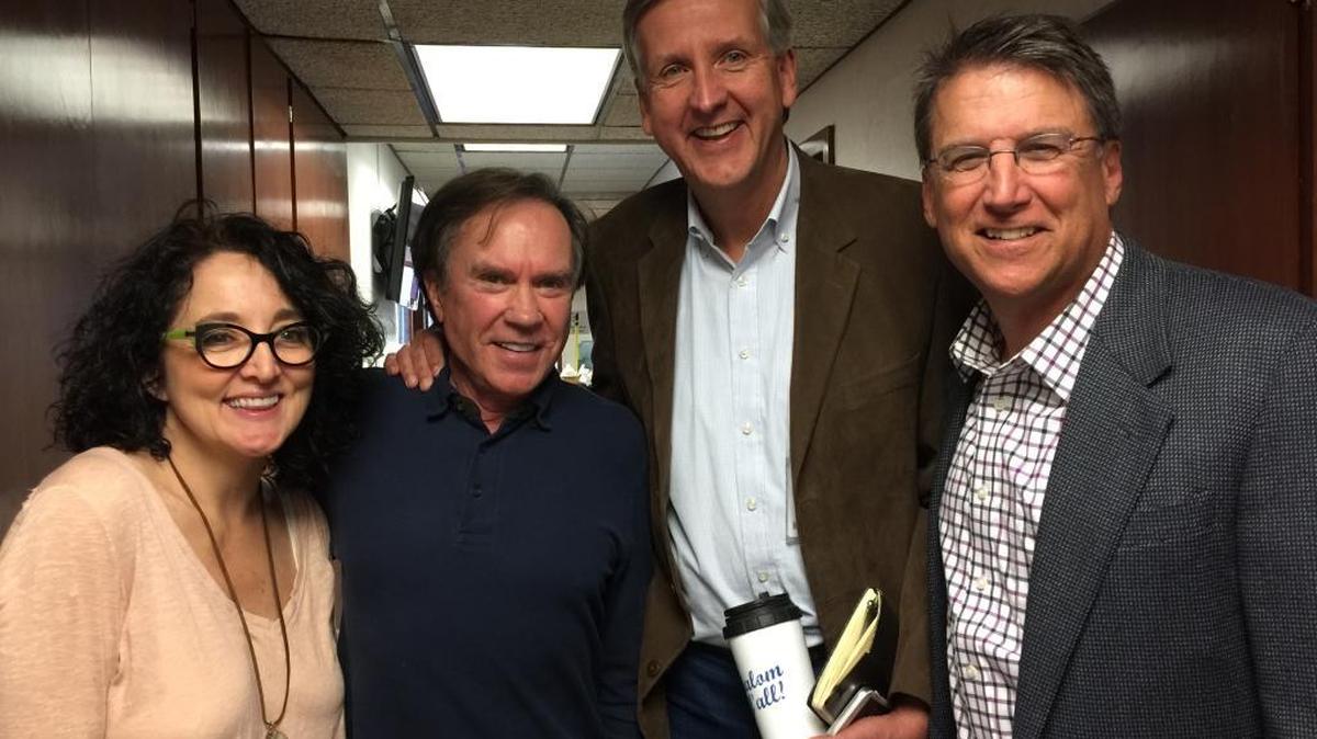 Posing for the Observer in the the halls of Charlotte’s WBT: (L to R) morning radio hosts Sheri Lynch and Bob Lacey, the Rev. David Chadwick and former N.C. Gov. Pat McCrory.