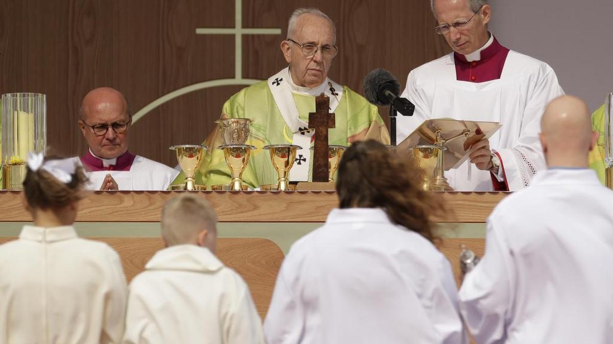 Pope Francis celebrates Mass at the Phoenix Park in Dublin, Ireland, on Sunday. During his two-day visit he has addressed the clergy sex abuse crisis in the Catholic Church.