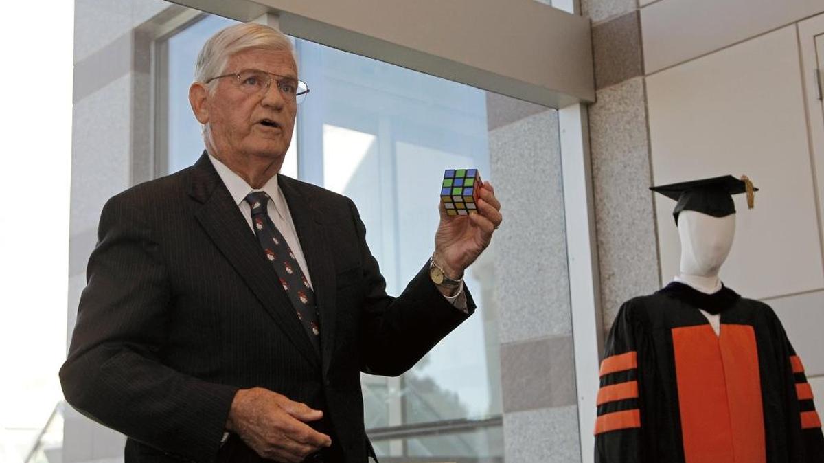 Former N.C. Gov. Jim Martin talks about a Rubik's cube he used on the campaign trail as he speaks at the N.C. Museum of History in downtown Raleigh on Oct. 27, 2014.