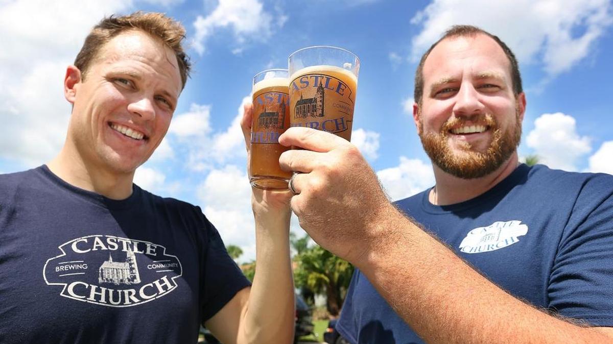 Jared Witt, left, and Aaron Schmalzle, co-founders of Castle Church Brewing Community, hoist some micro-brewed beers outside Schmalzle's Kissimmee, Fla. home. They plan to open a brew pub in downtown Orlando in coalition with their Lutheran faith.