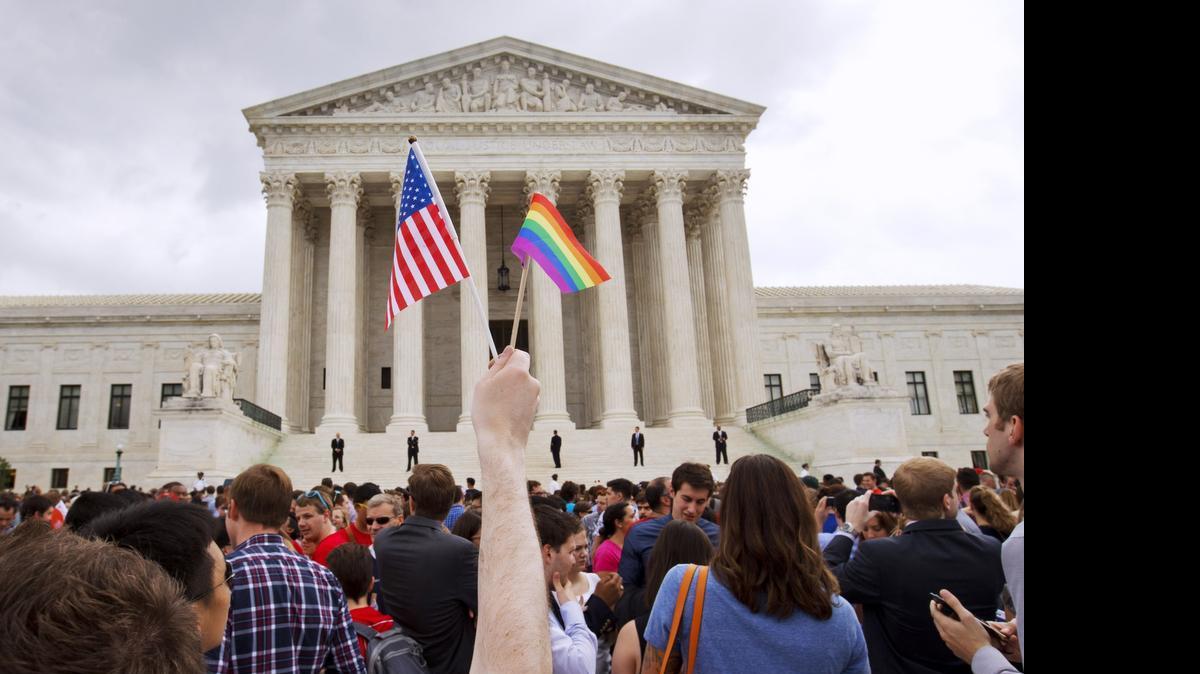 
The crowd celebrates outside of the Supreme Court in Washington in June after the court declared that same-sex couples have a right to marry anywhere in the United States.
