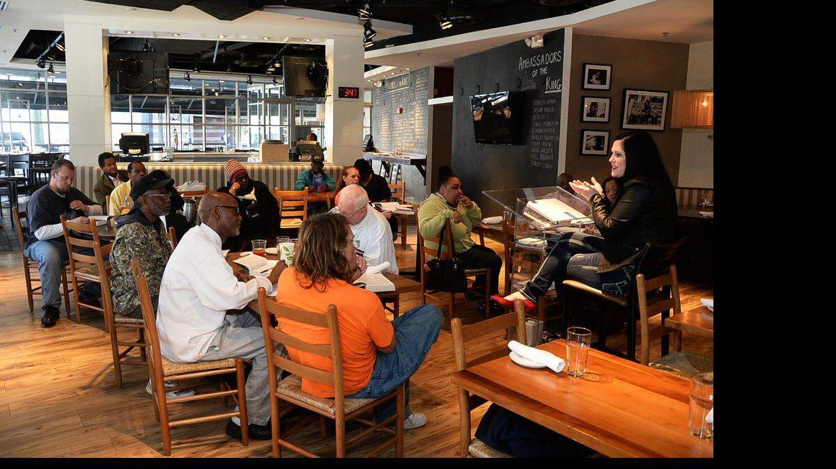 
Pastor Amy Lambert-Frowine leads a recent midafternoon Bible study at The King's Kitchen.
