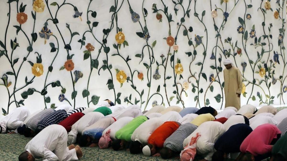 Muslims offer afternoon prayers.