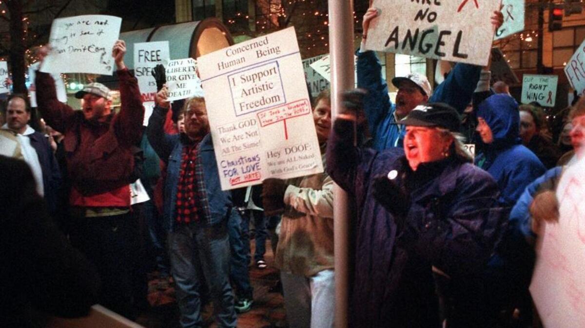 Supporters and opponents of "Angels in America" rallied in front of the North Carolina Blumenthal Performing Arts Center in March 1996.