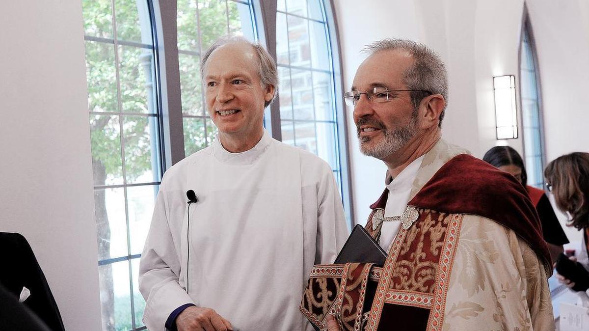 The Rev. Samuel Rodman, left, awaits the procession of his ordination and consecration Saturday with the bishop of the Diocese of Massachusetts, Alan Gates, in the Duke Divinity School in Durham. Rodman will lead The Episcopal Church diocese for Central North Carolina, which includes Charlotte, Greensboro and the Triangle.