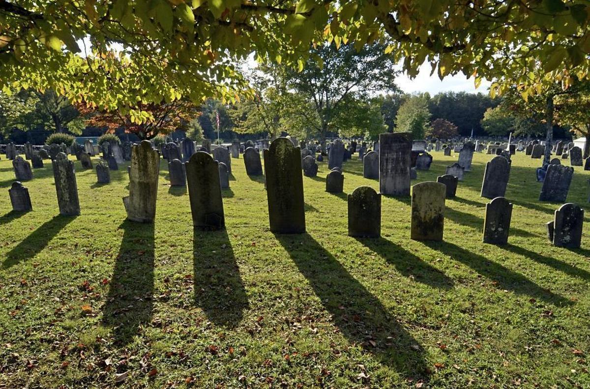 Headstones of various stonecutting traditions in the historic cemetery at Steele Creek Presbyterian Church. The church, the second-oldest in Mecklenburg County, will retain ownership of the graveyard even if it ends up selling its property to Charlotte’s airport.