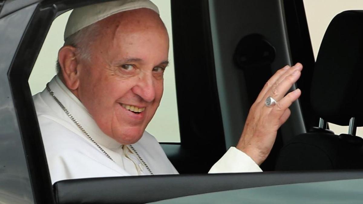 Pope Francis, who will be the subject of two lectures in Charlotte in January 2016, visited the United States last year. Here, he waves from the back of his Fiat after arriving from Cuba on September 22, 2015 at Joint Base Andrews, Maryland.