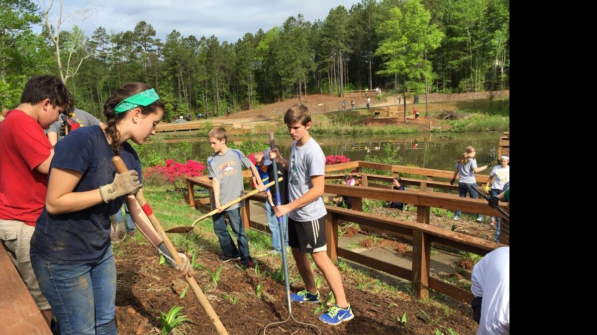 
Youth ages 12-18 and their leaders completed service work at Dogwood Park in Wesley Chapel. Mike Como, the council liaison for Parks and Recreation in Wesley Chapel, said, “The youth helped tremendously. They finished a lot of projects that were half done. This park was built by volunteers and it is heartwarming to see so many young people from the community come out to help maintain it.”
