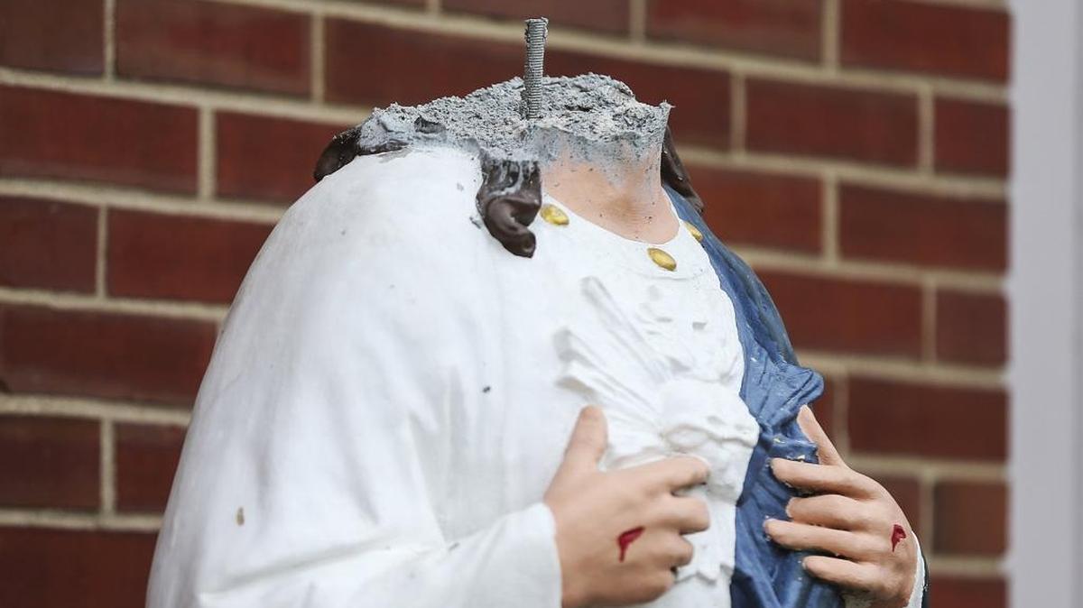 This photo shows a Jesus statue vandalized outside of Cottage Avenue Pentecostal Fellowship in the Bates-Hendricks neighborhood of Indianapolis, Tuesday, Feb. 21, 2017. A pastor said the statue of Jesus has been vandalized twice this month.