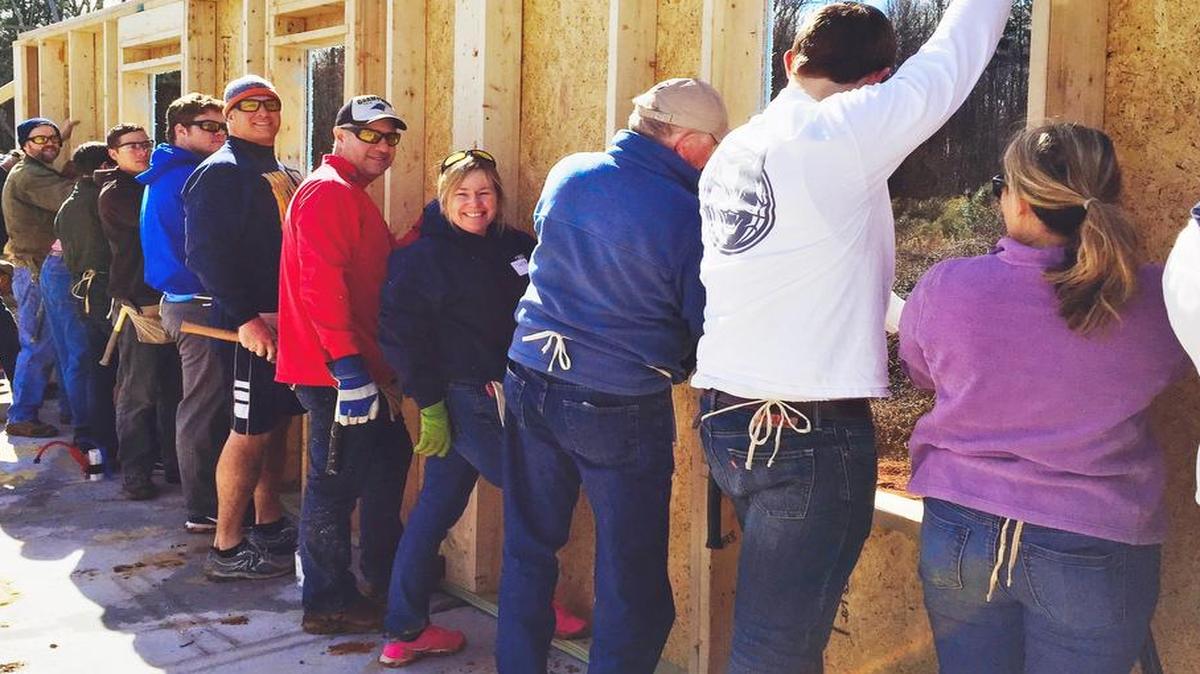 Volunteers work at the Habitat for Humanity house in Cornelius. Volunteers are needed every Saturday.