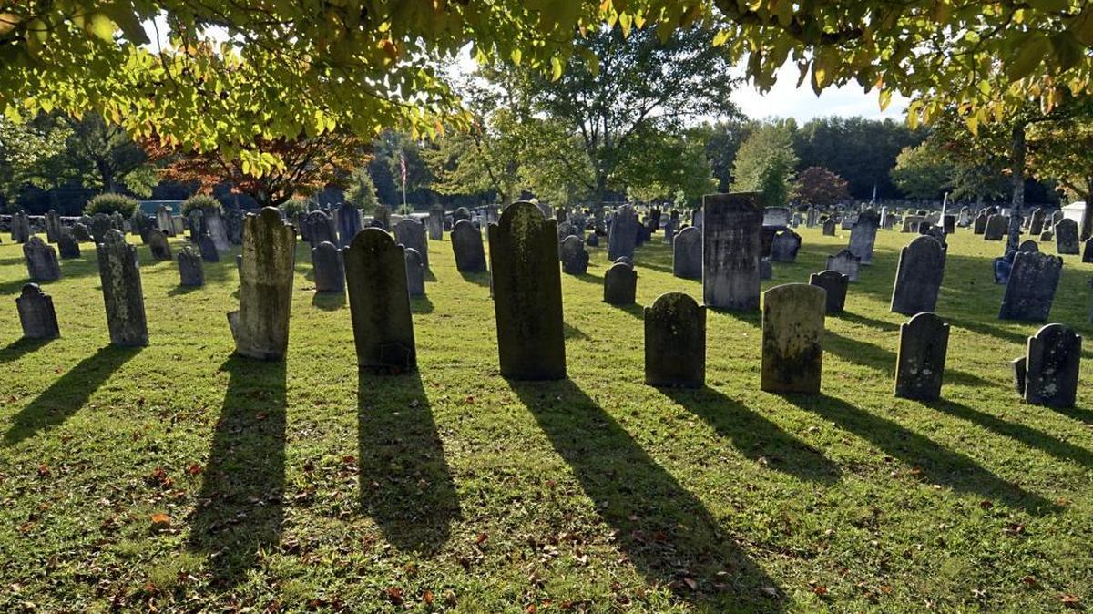 Headstones of various stonecutting traditions in the historic cemetery at Steele Creek Presbyterian Church. The church, the second-oldest in Mecklenburg County, will retain ownership of the graveyard even if it ends up selling its property to Charlotte’s airport.