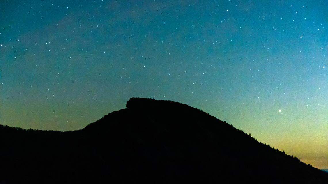 A starry sky over a mountain top in North Carolina.