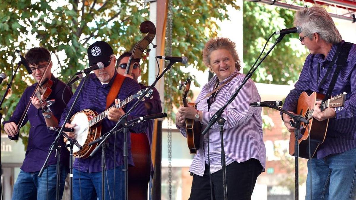 
Lorraine Jordan sings with Carolina Road during the Wide Open Bluegrass festival on Fayetteville Street last year.
