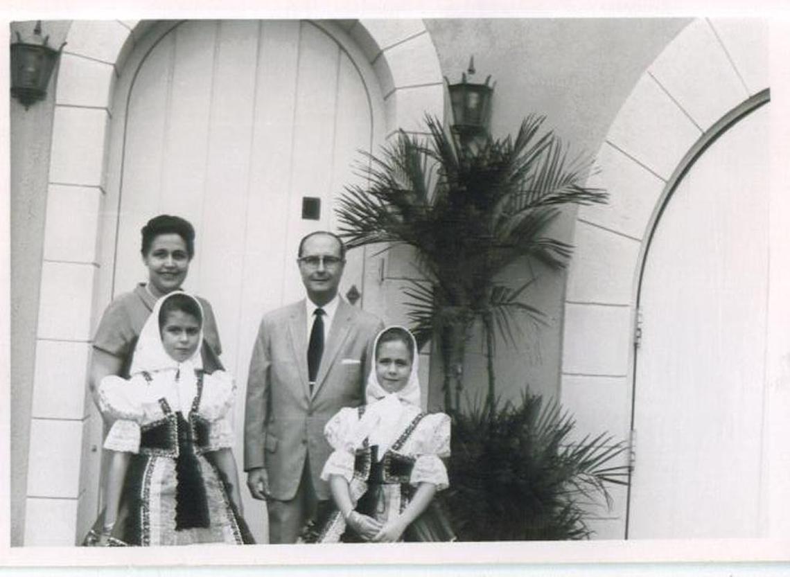 My grandparents pose with my mother and aunt in front of their Havana home not long before my mother and aunt were sent to the United States during the Cuban Revolution. The home is now a Spanish restaurant.