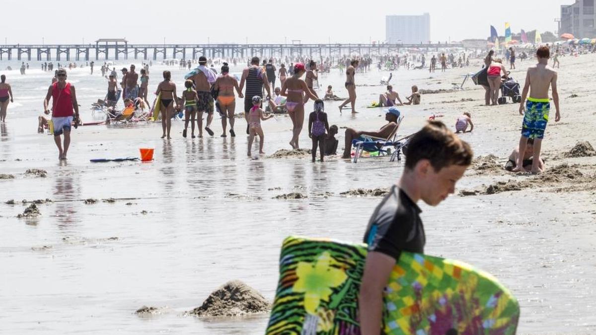 Sunbathers fill the beach near 24th Avenue South in Myrtle Beach on Thursday, July 21 2016.