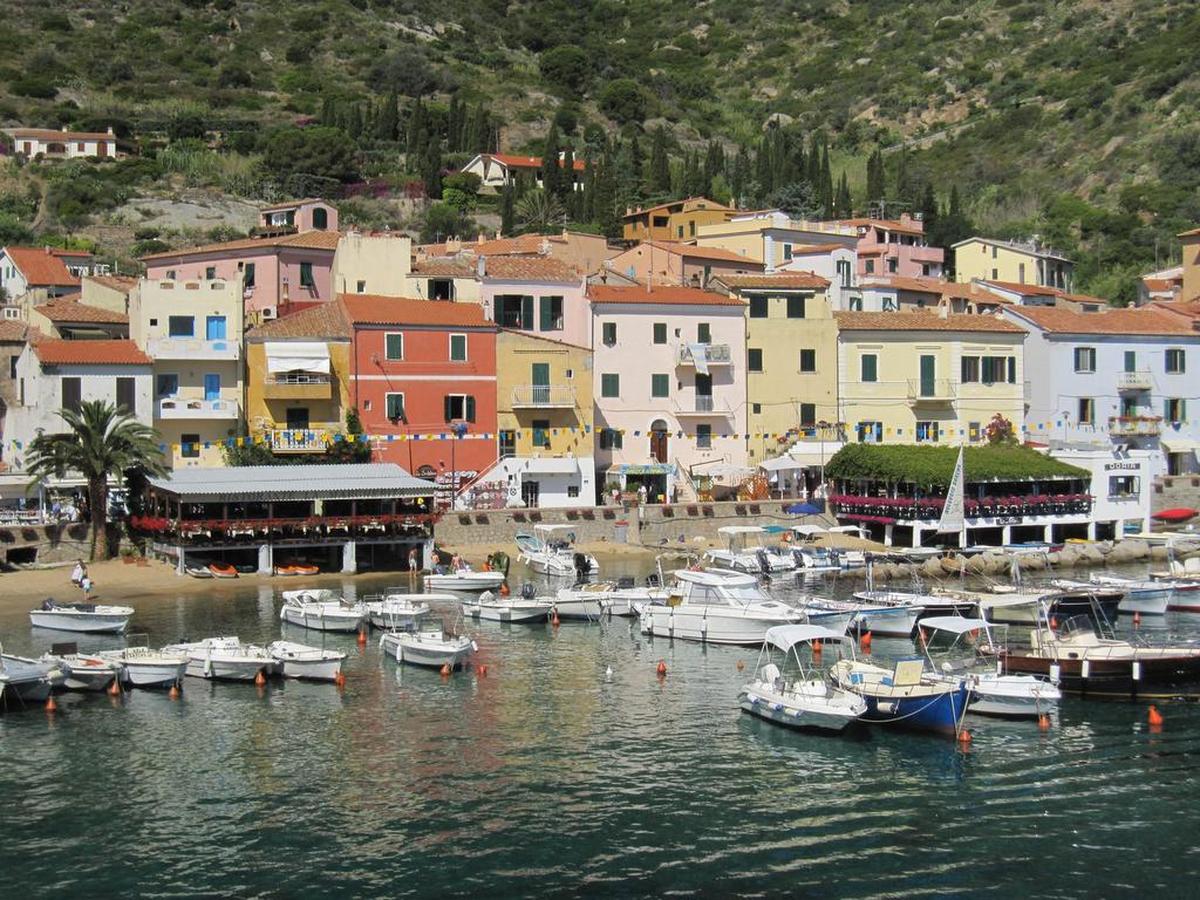 Giglio Porto is the main harbor on the island of Giglio. From here, we took a water taxi for a hold-onto-your-hats ride to the other side of the island and the climb to Pardini’s Hermitage.