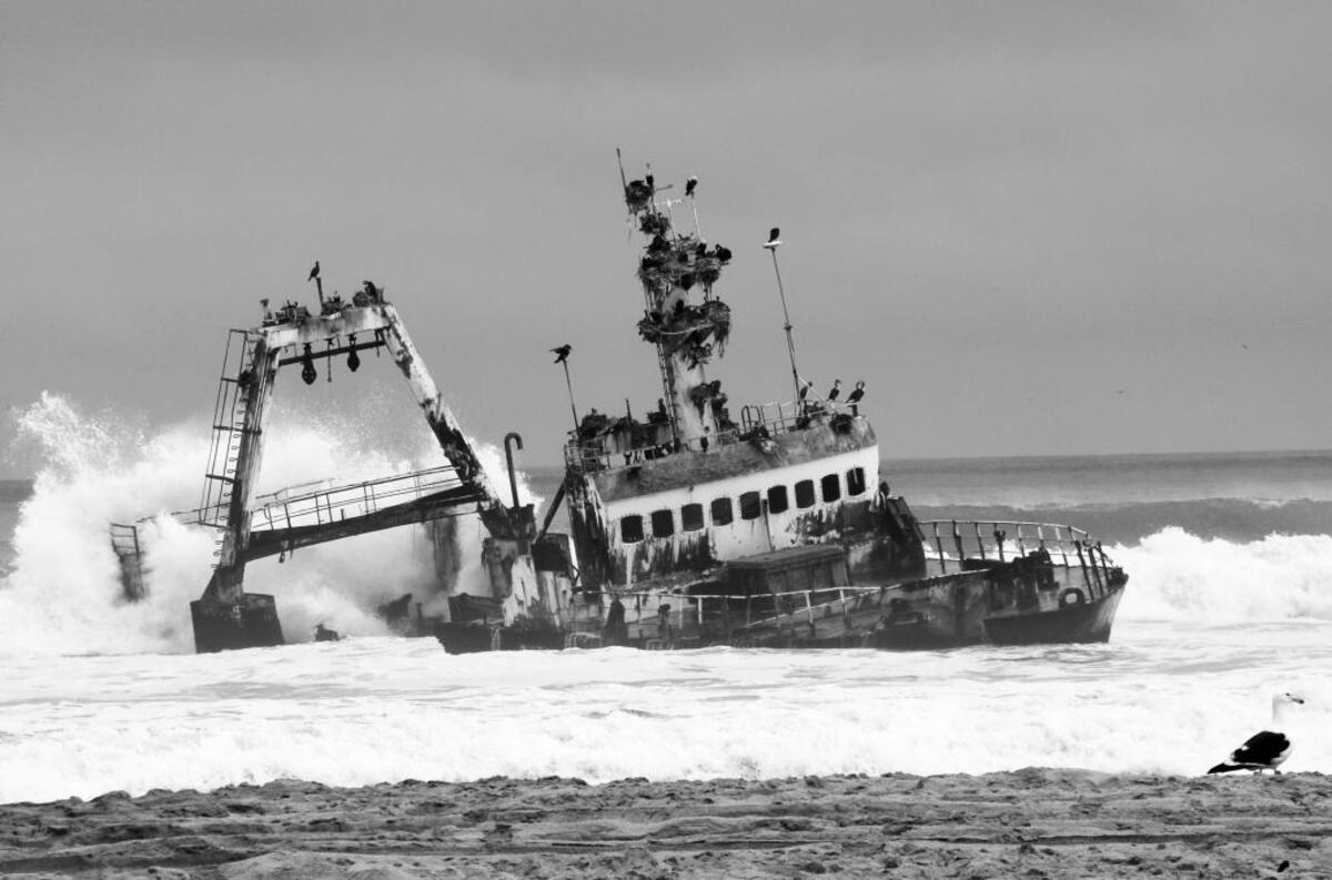 A shipwreck welcomes me to the notorious Skeleton Coast.