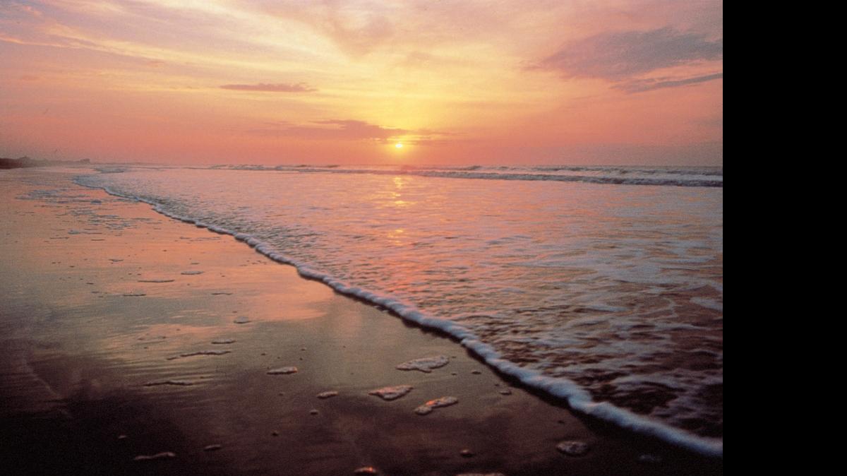 
This undated photo provided by the Kiawah Island Golf Resort shows sunrise as seen from Beachwalker Park, Kiawah Island, South Carolina. The beach was listed as No. 8 on the 2015 list of best beaches, a list compiled annually by Florida International University Professor Stephen Leatherman, also known as Dr. Beach. 
