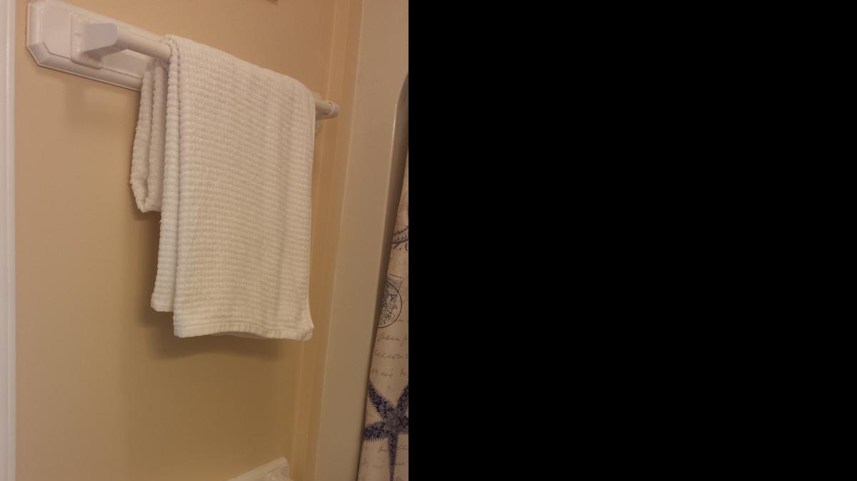 
Studs are rarely where you need them when installing towel bars. My Clever husband cut two 30-inch by 3 and 1/2-inch boards ( 3/4-inch thick.) He routed the edges and painted them to match the trim. 
