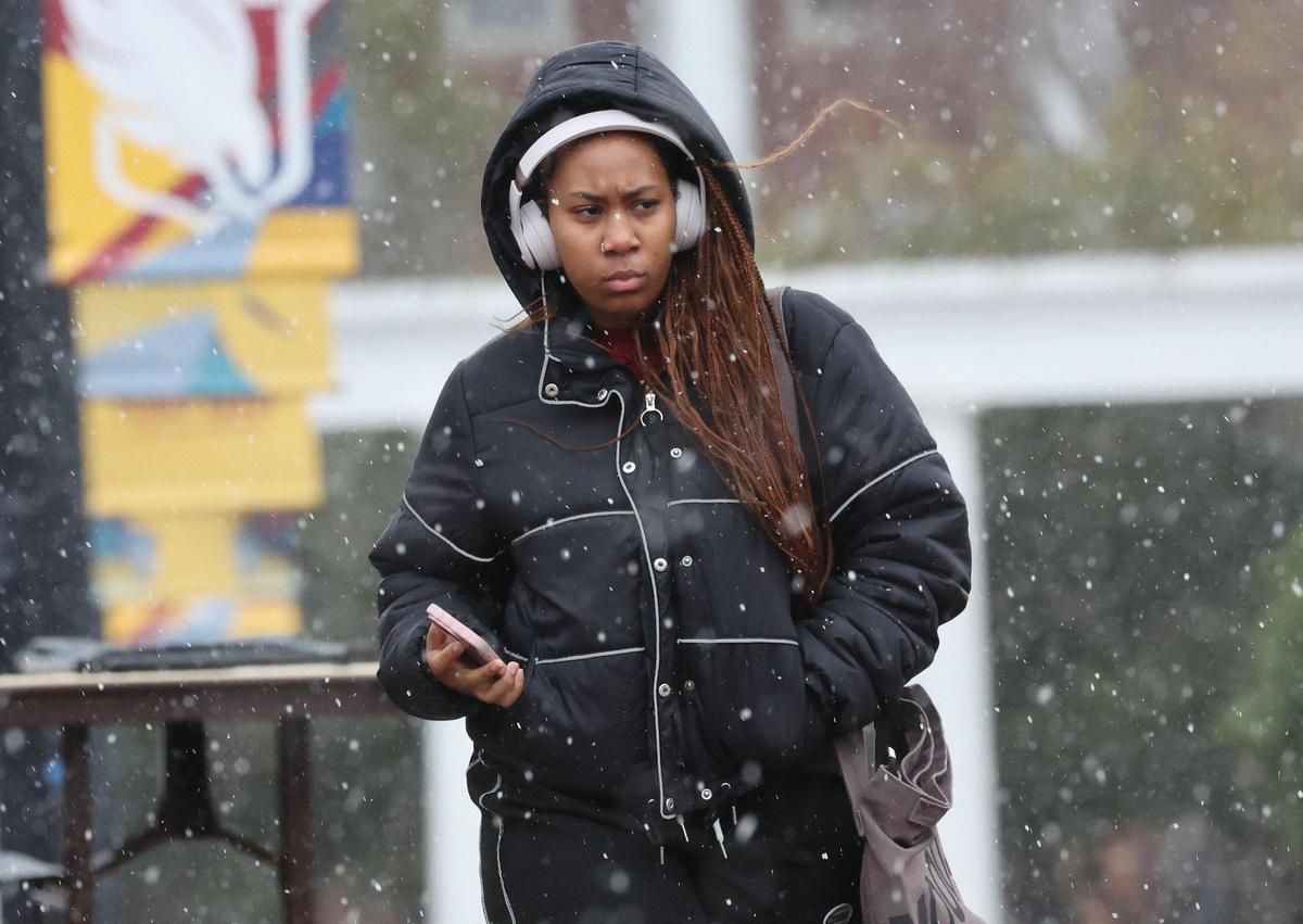 Olivia Andrews walks in the snow Wednesday at Winthrop University.