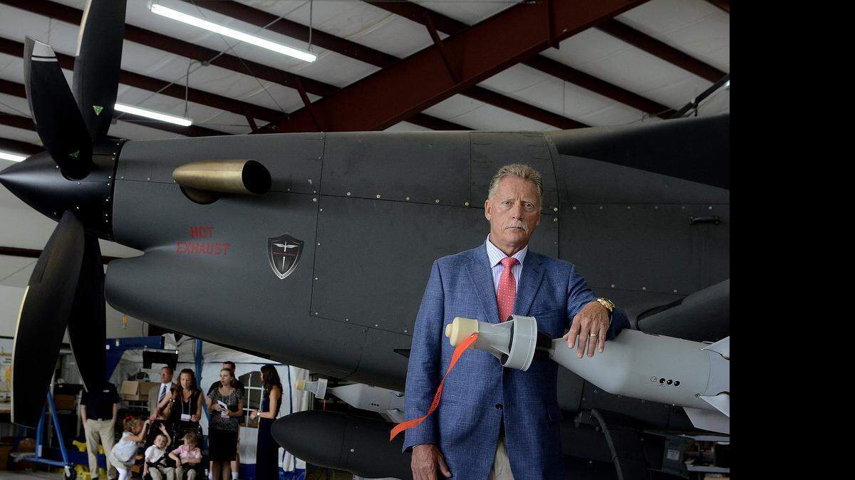 
Ron Howard, CEO of Mooresville-based IOMAX USA, celebrates the completion of the fist Archangel precision-strike aircraft produced in North Carolina.
