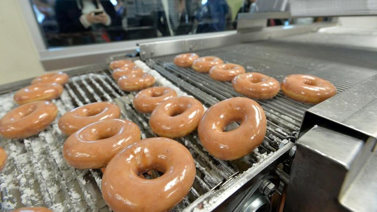 Krispy Kreme, founded in 1937, has quietly opened its new corporate office in a refurbished textile mill in South End.