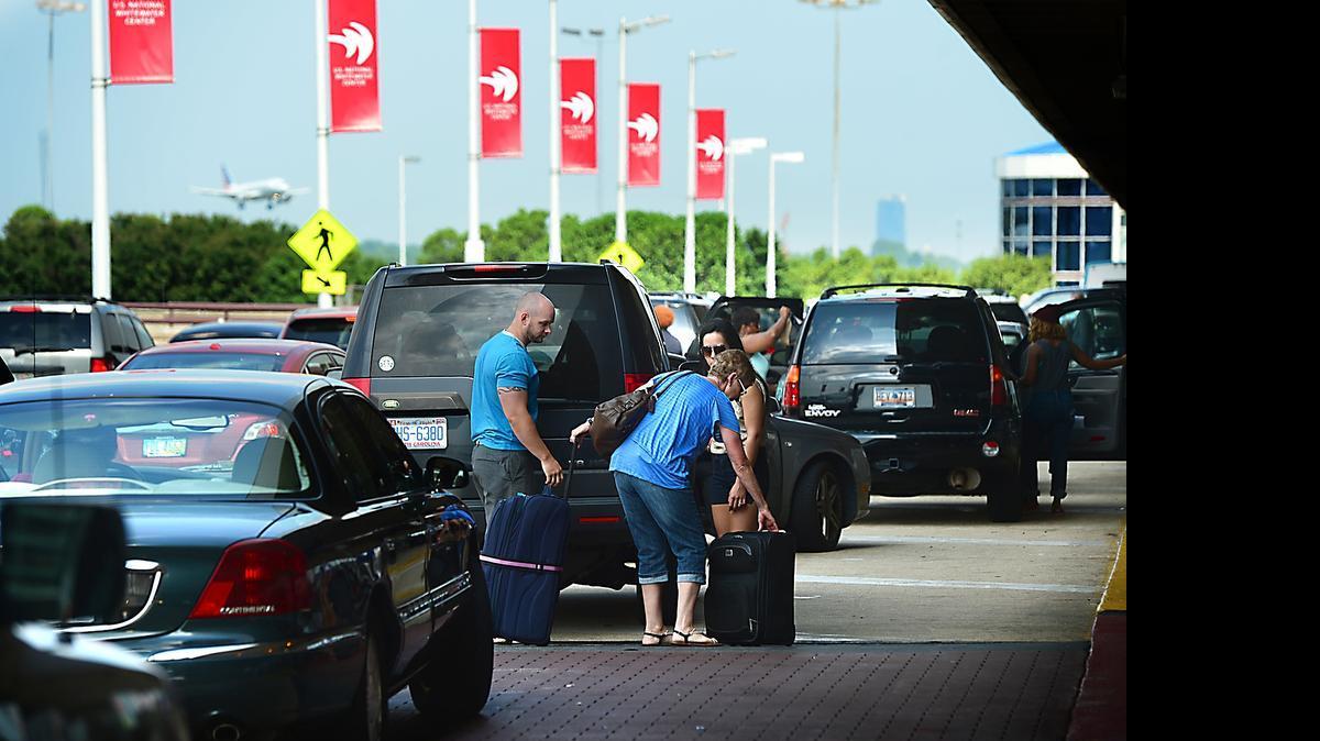 
Travelers arrive at the terminal at Charlotte Douglas International Airport. Officials wrapped up an eight-year, $1.5 billion round of construction projects Charlotte’s airport Monday and promptly kicked off a 10-year, $2.5 billion program that will change the roadway passengers use, the terminal and the airfield itself.

